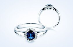 Anelli di fidanzamento con una pietra colorata