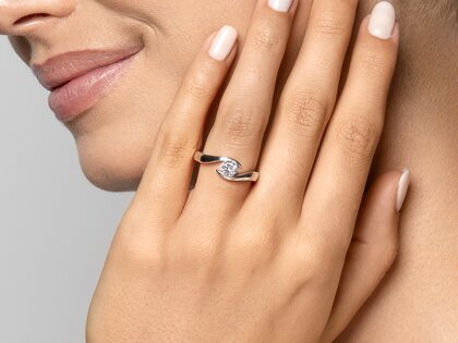 Anello di Fidanzamento Twist in platino 950/- con diamante 0,50ct G/SI
